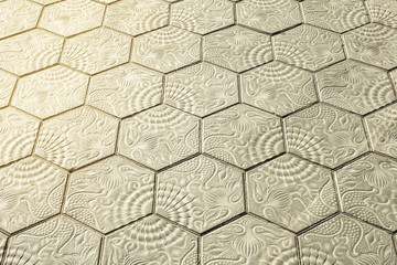 Detail of pavement and tiles in Barcelona, Spain
