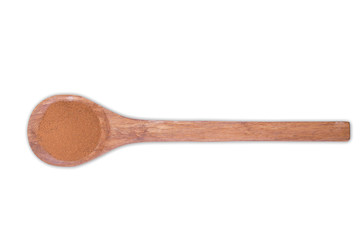 Cinnamon powder on wooden spoon isolated on white background
