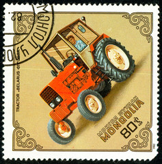 Ukraine - circa 2018: A postage stamp printed in Mongolia show Tractor Belarus-611, USSR. Series:...
