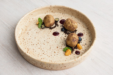 Delicious creative cakes made in the form of real raw potatoes