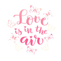 Fototapeta na wymiar Love is in the air. Vector lettering. Decorative phrase about love for Valentines Day card or holiday design