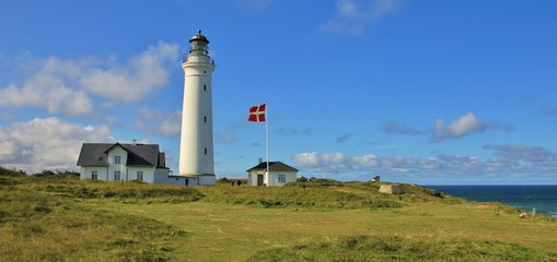 Beautiful old lighthouse in Hirtshals, Denmark. - obrazy, fototapety, plakaty