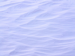 Wavy snow surface texture.