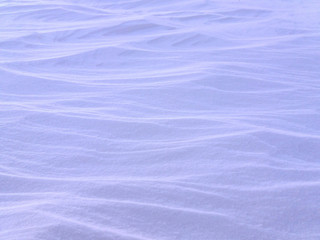 Wavy snow surface texture.