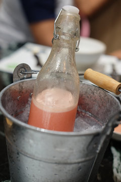 Healthy drink bottle in bucket