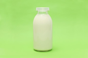 Fresh milk isolated on colorful background
