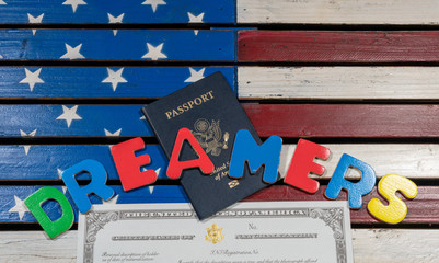 Fototapeta na wymiar Dreamers concept using spelling letters on US flag