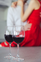 Close up of glasses with wine on table
