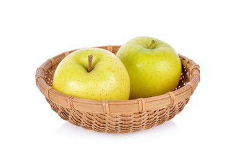 fresh Toki apples in bamboo basket on white background