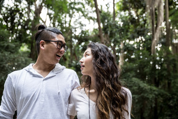 Asian Couple Walking in the Park
