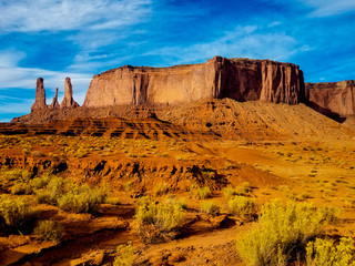 This image was captured in Monument Valley, Arizona. These Navajo lands are noted for their magnificent land formations and spectacular red rock.