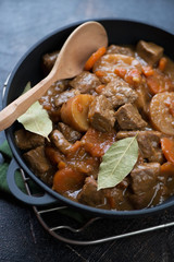 Closeup of Irish beer and beef stew, traditional meal especially for Saint Patrick’s Day, selective focus