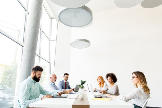 Business People Around Table During Staff Meeting