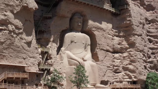 The Bingling Temple, or Bingling Si, in Gansu province, China, Asia. Grottoes, caves and caverns with giant Maitreya Buddha and Buddhist statues. Chinese art, landmark, monument carved in stone