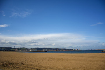 Fototapeta na wymiar Photo of a landscape with beach, blue sky and sunlight