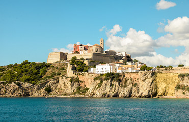 Ibiza, Spain - October 5, 2017 : Beautiful view of boat port and old town of Ibiza city and Formentera islands, Spain. Sea rest and holiday concept. View from boat and water. Popular summer resort.