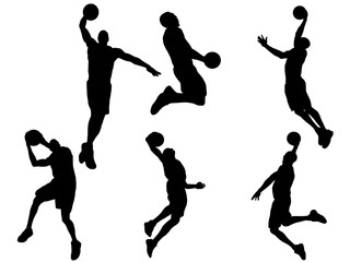 Basketball player dunking silhouette