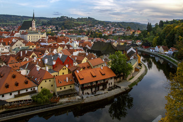 Fototapeta na wymiar View to Cesky Krumlov and river Vltava, view of the city from the top in sunny day. Czech Republic. Historical town. UNESCO World Heritage.
