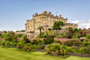 Fototapeta na wymiar Calzean castle and blossoming garden in Scotland, UK