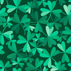 Clover and shamrocks. Seamless vector pattern.