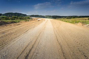 Fototapeta na wymiar road construction. sand and crushed stone