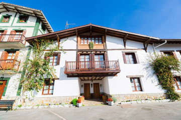 The supermoon departing through a Basque mountain