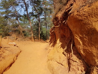 Red goround of ocher of Roussillion town region.. Europe. France. Summer 2016.