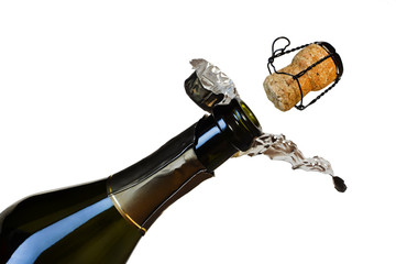 a bottle of champagne and a departing cork isolated on a white background