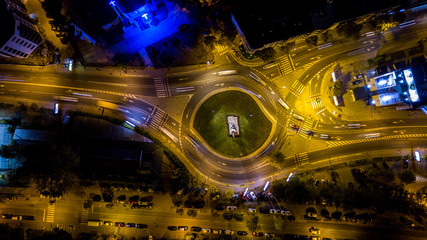 Aerial view of a roundabout in a city . drone long exposure view