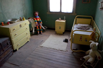 Inside a preserved children's bedroom in the Humberstone Saltpeter Works