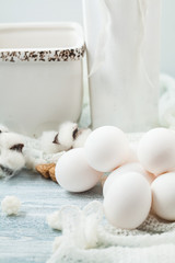 Fototapeta na wymiar Easter white eggs on a light background Background for a postcard