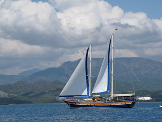 Fototapeta na wymiar Europe. Mediterranean sea. Turkish riviera. Sud-western coast. Ekincik National park. Luxury sailing boat. Summer 2012. 