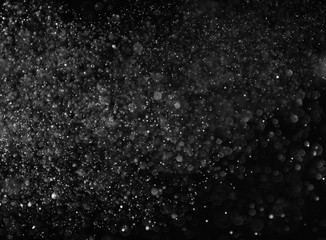 The texture of the snow on a black background