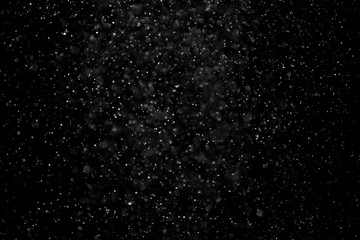 The texture of the snow on a black background