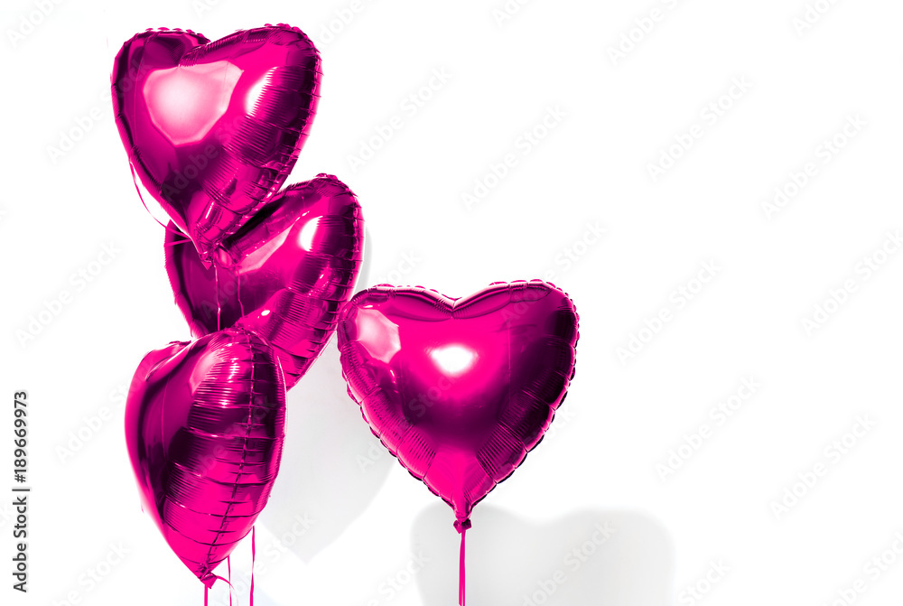 Poster Valentine's Day. Air balloons. Bunch of purple heart shaped helium balloons isolated on white background