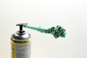 polyurethane expanding foam glue gun.