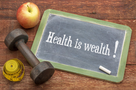 health is wealth text on blackboard