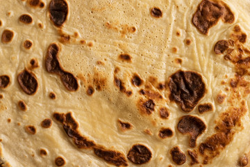texture of a surface of subfried flat cake