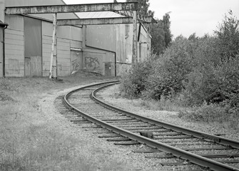 Fototapeta na wymiar An old industry where the train tracks have no function anymore