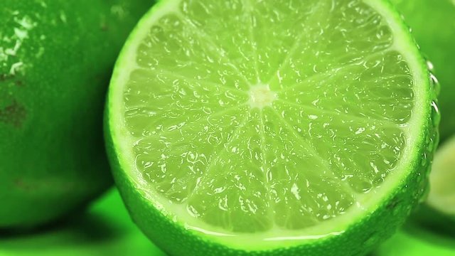 Green lime with drops of water, citrus aurantiifolia