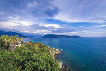 Fototapeta na wymiar Shore of Herceg Novi coastal town at the entrance to Kotor Bay in Montenegro