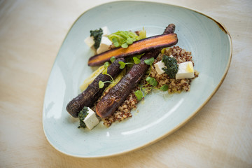 Kinoa with purple carrots, borecole, goat chese and mint oil