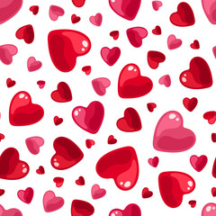 Vector seamless pattern with red and pink hearts on a white background.