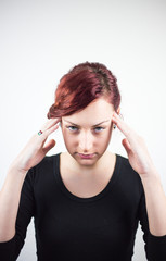 A young girl with facial expression, and hands shows that the pain is headache, headache, pain, white background, facial expressions