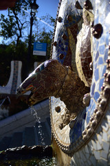 Park Guell - fountain mosaic sculpture in Barcelona. - obrazy, fototapety, plakaty