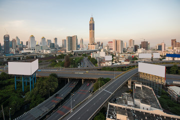 Naklejka premium Panoramic Bangkok city building modern business district with expressway in downtown at morning in Bangkok, Thailand..