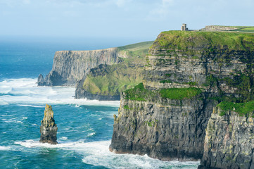 O'Brien's Tower on The Cliffs of Moher, Irelands Most Visited Natural Tourist Attraction, are sea...