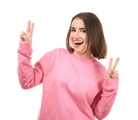 Portrait of young smiling woman on white background