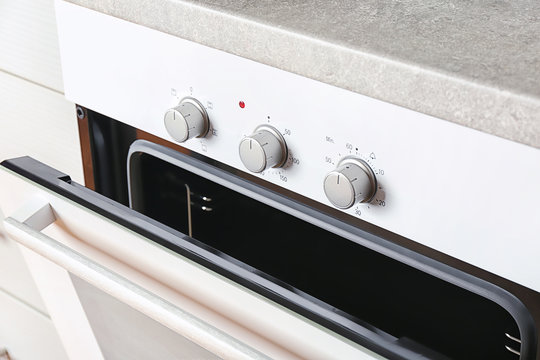 Modern electrical white oven in kitchen