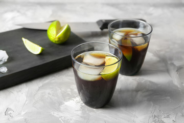 Glasses with Cuba Libre cocktail on table